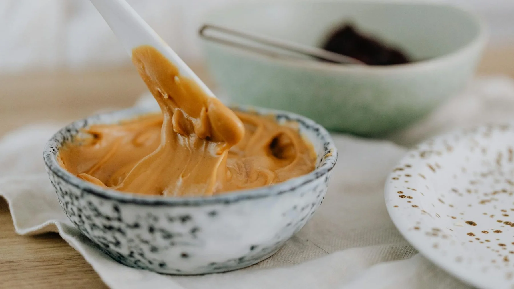 close up photo of creamy peanut butter